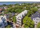 Beautiful home with large balconies nestled among lush trees in a picturesque neighborhood with mature landscaping at 5 Legare St # C, Charleston, SC 29401