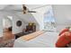 Spacious bedroom featuring a vaulted ceiling, unique decor, and bright natural light at 5 Legare St # C, Charleston, SC 29401