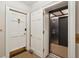 Hallway leading to elevator and doorway with fox knocker at 5 Legare St # C, Charleston, SC 29401
