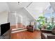 Cozy room with angled ceiling, vintage furnishings, and lots of natural light at 5 Legare St # C, Charleston, SC 29401