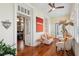 Bright sun room with comfortable seating, hardwood floors, and decorative accents at 5 Legare St # C, Charleston, SC 29401