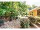 Secluded backyard with mature trees and lush landscaping, providing privacy and tranquility at 5002 W Liberty Meadows Dr, Summerville, SC 29485