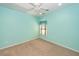 Bedroom featuring carpet, light blue walls, a ceiling fan and a window with a valence at 5002 W Liberty Meadows Dr, Summerville, SC 29485