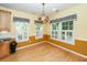 Bright dining area with ample natural light and stylish window treatments at 5002 W Liberty Meadows Dr, Summerville, SC 29485