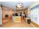 Open-concept kitchen flows into living room with bar and modern appliances at 5002 W Liberty Meadows Dr, Summerville, SC 29485