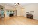 Spacious living room with hardwood floors, ceiling fan, recessed lighting, and neutral paint at 5002 W Liberty Meadows Dr, Summerville, SC 29485