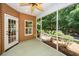 Relaxing screened porch offering a view of the landscaped backyard at 5002 W Liberty Meadows Dr, Summerville, SC 29485
