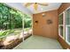 Screened porch with lush greenery and ample natural light at 5002 W Liberty Meadows Dr, Summerville, SC 29485