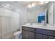 Well-appointed bathroom features double sink vanity, modern fixtures, and shower with tub at 502 Duskywing Dr, Goose Creek, SC 29445