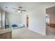 Bedroom with ample lighting and a connecting bathroom provides a private and comfortable space at 502 Duskywing Dr, Goose Creek, SC 29445