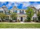 Inviting townhouse with a covered porch, manicured landscaping, and charming curb appeal at 502 Duskywing Dr, Goose Creek, SC 29445
