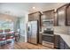 Stylish kitchen featuring stainless appliances, sleek cabinetry, and open layout to the adjacent dining area at 502 Duskywing Dr, Goose Creek, SC 29445