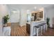 Inviting living space boasts breakfast bar, connecting the kitchen to the living area at 502 Duskywing Dr, Goose Creek, SC 29445