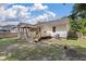 Backyard with a spacious porch and deck, perfect for outdoor entertaining at 5052 Hidden Forest Ln, North Charleston, SC 29420