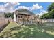 Backyard with a spacious porch and deck, perfect for outdoor entertaining at 5052 Hidden Forest Ln, North Charleston, SC 29420