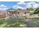 Backyard with a spacious porch and deck, perfect for outdoor entertaining at 5052 Hidden Forest Ln, North Charleston, SC 29420