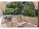 Open-air deck with a grill, ideal for outdoor cooking and dining at 5052 Hidden Forest Ln, North Charleston, SC 29420