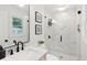 Bright bathroom features a marble countertop, glass shower, and modern fixtures at 521 Carpenter St, Charleston, SC 29412