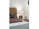 A well decorated bedside table, clock, and lamp in a modern bedroom at 521 Carpenter St, Charleston, SC 29412