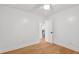 Bedroom featuring hardwood flooring, natural light, and an adjacent doorway at 521 Carpenter St, Charleston, SC 29412
