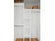 Spacious walk-in closet features built-in shelving, hanging racks, and ample storage space at 521 Carpenter St, Charleston, SC 29412