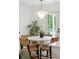Cozy dining area with a round table, stylish chairs, and a unique chandelier at 521 Carpenter St, Charleston, SC 29412