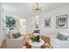 Open living room area featuring neutral decor and a view into other rooms at 521 Carpenter St, Charleston, SC 29412