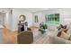 Bright and airy living room featuring modern decor and an open layout, providing a comfortable and stylish living space at 521 Carpenter St, Charleston, SC 29412