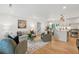 Cozy living room featuring modern decor and an open flow to the kitchen, perfect for entertaining and everyday living at 521 Carpenter St, Charleston, SC 29412