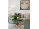 Close-up of a stylish coffee table, showcasing a unique design and decorative elements in the well-lit living room at 521 Carpenter St, Charleston, SC 29412