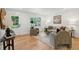 Comfortable living room showcasing a cozy atmosphere, seamless transition to the outdoors, and an open floor plan at 521 Carpenter St, Charleston, SC 29412