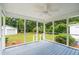 Enjoy this screened porch with a view of the backyard and detached two-car garage at 521 Carpenter St, Charleston, SC 29412