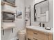 Well-organized bathroom with open shelving and neutral decor at 656 Coleman Blvd # 703, Mount Pleasant, SC 29464