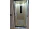 Home elevator with wooden interior, providing convenient access to different levels of the home at 656 Coleman Blvd # 703, Mount Pleasant, SC 29464