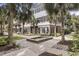 Beautiful townhome with a fountain and meticulous landscaping creates a welcoming curb appeal at 656 Coleman Blvd # 703, Mount Pleasant, SC 29464
