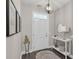 Inviting foyer with stylish decor, tiled flooring, and a modern light fixture at 656 Coleman Blvd # 703, Mount Pleasant, SC 29464