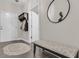 Hallway featuring a decorative mirror, bench, coat hooks, and tiled flooring at 656 Coleman Blvd # 703, Mount Pleasant, SC 29464