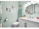 Bathroom features a white vanity, a toilet, and coastal decor at 7 Azalea Ct, Goose Creek, SC 29445