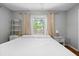 Bedroom with wood floors, a ceiling fan, a window, and a neutral color scheme at 7 Azalea Ct, Goose Creek, SC 29445