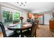 Eat-in kitchen features a sliding glass door, wood floors, stainless steel appliances and a granite countertop at 7 Azalea Ct, Goose Creek, SC 29445