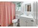 Bright bathroom featuring a modern vanity, neutral wall color, and a patterned shower curtain at 709 Black Oak Blvd, Summerville, SC 29485