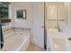 Clean bathroom features a separate bathtub and double vanity at 709 Black Oak Blvd, Summerville, SC 29485