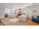 Spacious secondary bedroom with twin beds, hardwood floors, and ample natural light at 735 Woodward Rd, Charleston, SC 29407