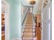 Welcoming foyer with carpeted stairs and neutral-toned walls, offering a glimpse into other rooms at 735 Woodward Rd, Charleston, SC 29407