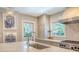 Bright kitchen featuring stainless steel appliances, white countertops and white subway tile backsplash at 735 Woodward Rd, Charleston, SC 29407