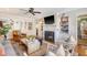 Relaxing living room features a fireplace and comfortable seating providing a cozy and inviting atmosphere at 735 Woodward Rd, Charleston, SC 29407