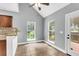 Cozy breakfast nook with vaulted ceiling, multiple windows, and access to deck at 8166 Scottswood Dr, North Charleston, SC 29418