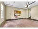 Well-lit garage with shelving and a utility area, providing ample storage space and convenience at 8166 Scottswood Dr, North Charleston, SC 29418