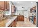Spacious kitchen with granite countertops, tile backsplash, stainless steel appliances, and ample cabinet space at 8166 Scottswood Dr, North Charleston, SC 29418