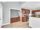 Open kitchen with stainless appliances, granite counters, tile backsplash, and access to dining and living areas at 8166 Scottswood Dr, North Charleston, SC 29418